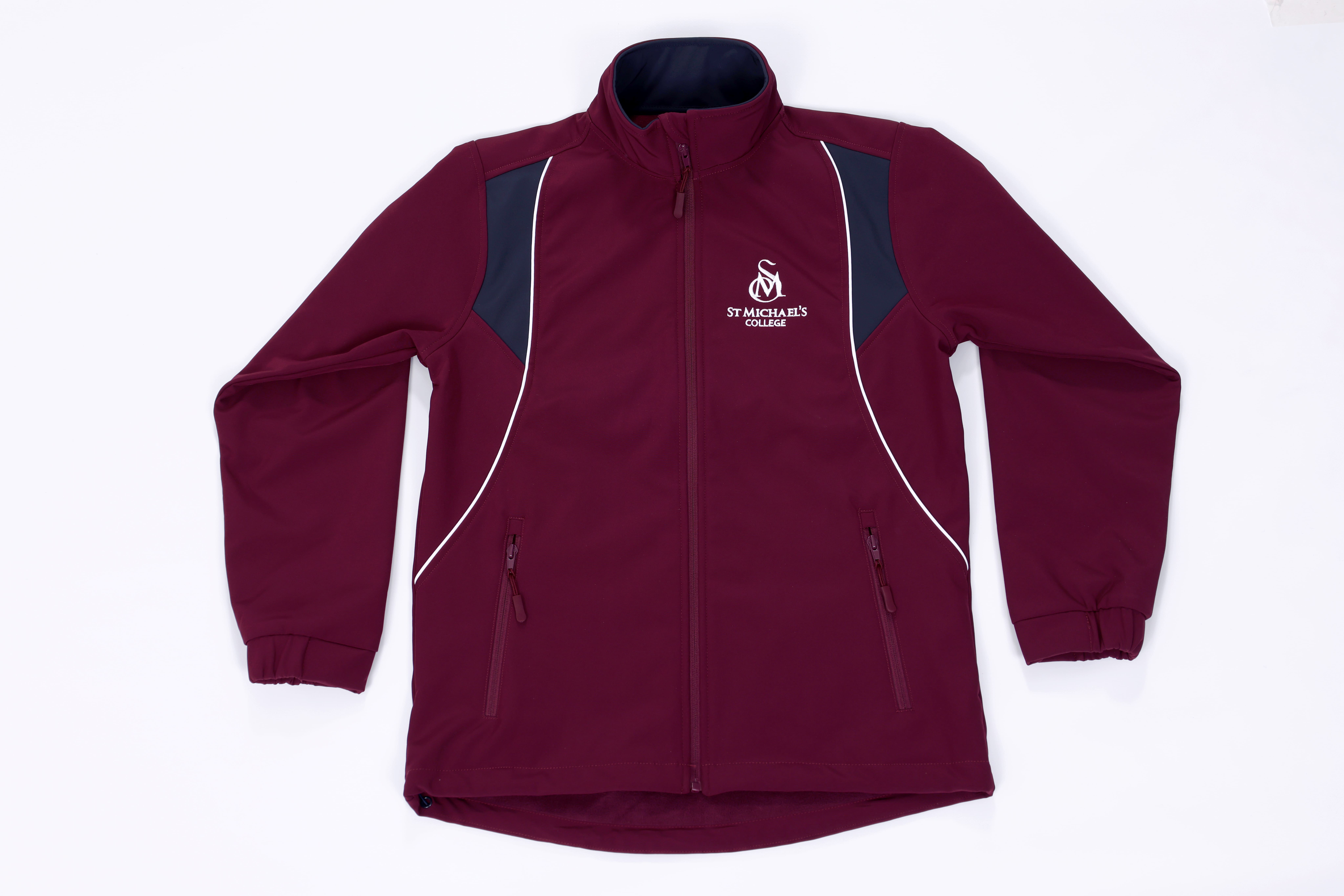 Maroon St Michael’s College sports jacket with zip front, side pockets and embroidered school logo displayed on a plain background